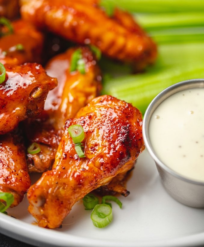 Spicy chicken wings served with ranch at Fat Duck's Pizza in South Sacramento